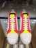 CHRISTIAN LOUBOUTIN Spiked Louis Trainers white pink and yellow 